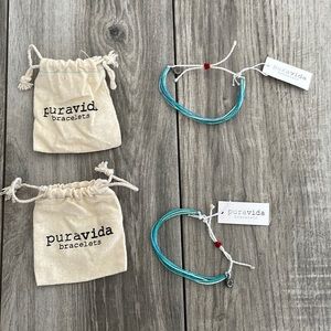 Lot of 2 Puravida bracelets with bags